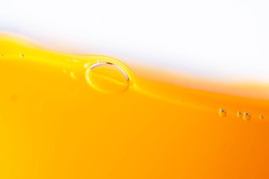 Parlak portakal suyu dokusu, sağlık ve doğa dalgaları, güzel dalgalar eğrisi ve garfik tasarım ve arka plan için pürüzsüz küçük kabarcıklar.