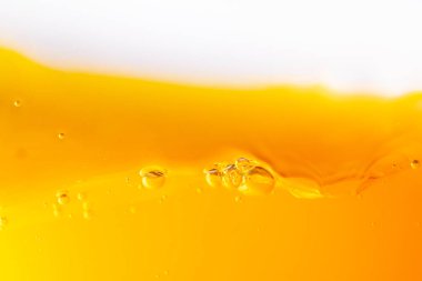 Parlak portakal suyu dokusu, sağlık ve doğa dalgaları, güzel dalgalar eğrisi ve garfik tasarım ve arka plan için pürüzsüz küçük kabarcıklar.