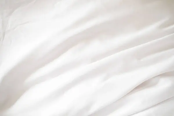 stock image Abstract White Bedding Sheets or White wrinkled fabric background texture and Texture with copy-space :Creased or wrinkled white fabric,Soft focus