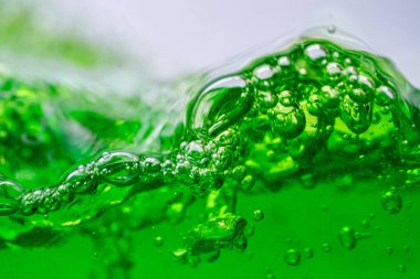 Su dalgası, kabarcıklı yeşil sıvıyı kapat, captu.