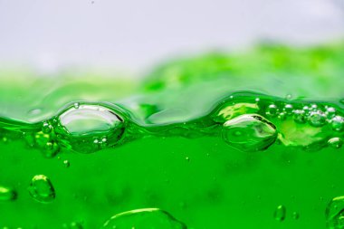 Su dalgası, kabarcıklı yeşil sıvıyı kapat, captu.