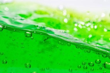 Su dalgası, kabarcıklı yeşil sıvıyı kapat, captu.