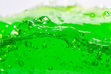 Su dalgası, kabarcıklı yeşil sıvıyı kapat, captu.