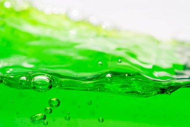 Su dalgası, kabarcıklı yeşil sıvıyı kapat, captu.