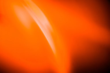 Soyut kırmızı turuncu bulanık ışık arkaplanı. Bulanık hareket gradyan karışık renk arkaplanı. Yaratıcı tasarım, pazarlama malzemeleri, teknolojik görseller ve modern grafik sanat projelerinde kullanım için ideal