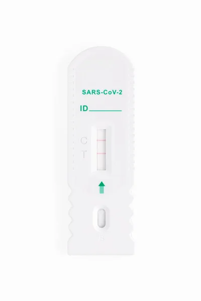 Positive covid test. Test results for Covid-19. rapid test on a white background. SARS-CoV-2 Ag Rapid Antibody Test Kit. Nasopharyngeal swab. Close up.