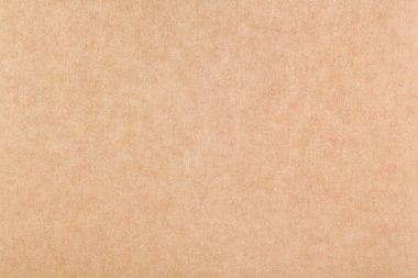 Bir yaprak kağıt kahverengi karton. Doku yakın plan, doğal kaba dokulu kağıt arkaplan.