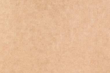 Bir yaprak kağıt kahverengi karton. Doku yakın plan, doğal kaba dokulu kağıt arkaplan.