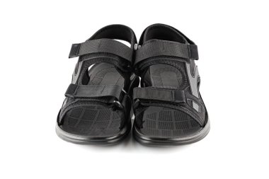 Beyaz arka planda siyah erkek terlikleri.