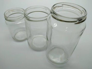 empty glass bottle with big hole