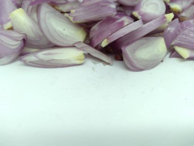 red onion slices over white backgroundred onion slices over white background
