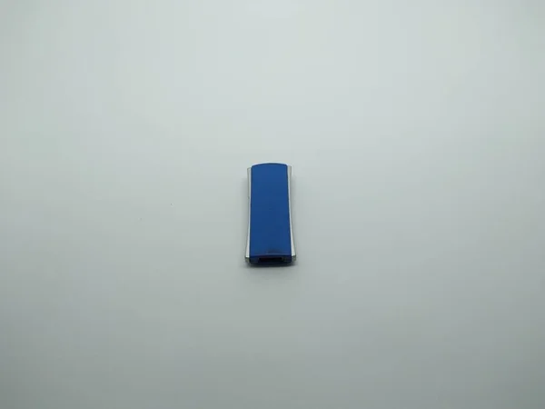 flash memory which is blue in the shape of a square