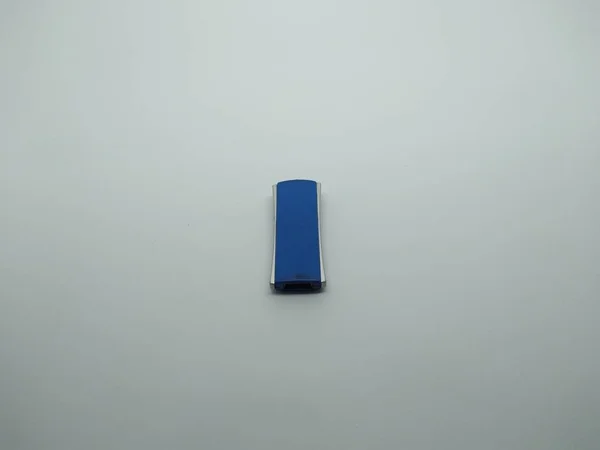flash memory which is blue in the shape of a square