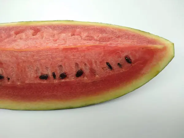 pieces of red watermelon with black seeds in fresh condition