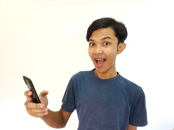 Wow Surprise Face Asian Man Use Smartphone Copy Space Advertisement — Stok fotoğraf