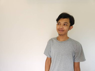 Warm smile face of kind asian man isolated white background. Happiness concept