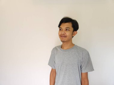 Warm smile face of kind asian man isolated white background. Happiness concept