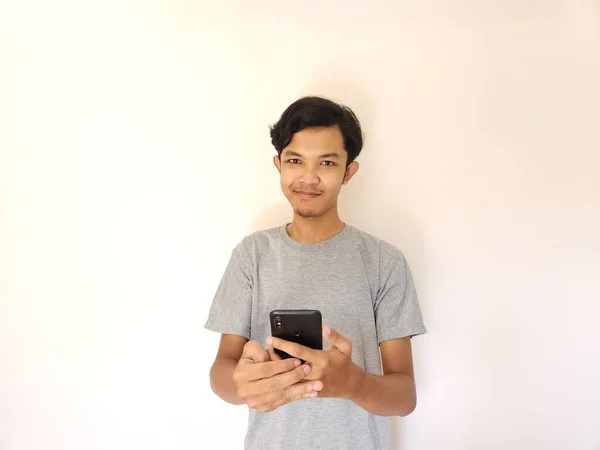 Wow Surprise Face Asian Man Use Smartphone Copy Space Advertisement —  Fotos de Stock