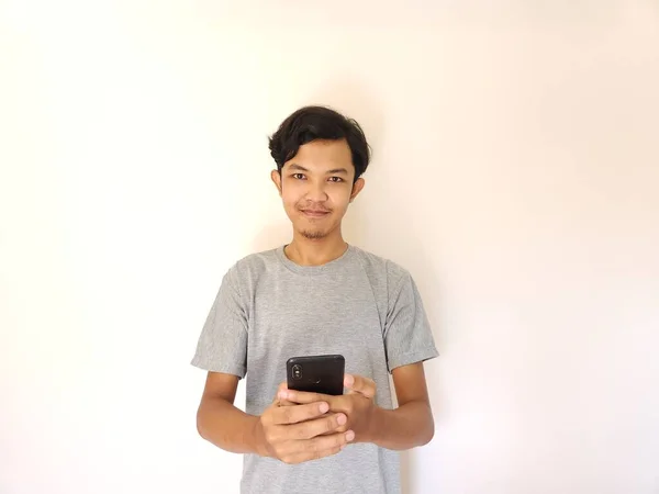 Wow Surprise Face Asian Man Use Smartphone Copy Space Advertisement — Stok Foto