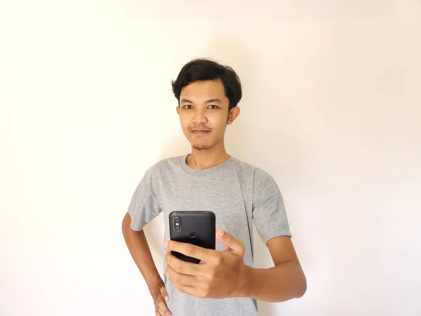 Wow Surprise Face Asian Man Use Smartphone Copy Space Advertisement — Stock fotografie
