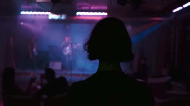 Entertainment Concept Light Illuminates Musical Group Band Backlights Silhouettes Audience — Stockvideo