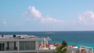 View of balconies and terraces of Royal Islander Club La Plage from neighboring hotel