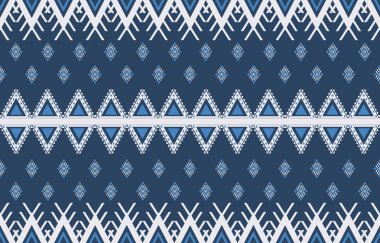 Aztek ve Navajo motiflerinin yer aldığı geometrik etnik Amerikan Yerli kabile desenleri kusursuz bir dekoratif doku oluşturur. Arkaplan, perde, halı, giysi, ambalaj için tasarım, Batik.
