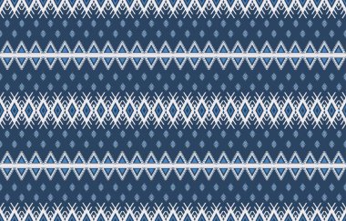 Aztek ve Navajo motiflerinin yer aldığı geometrik etnik Amerikan Yerli kabile desenleri kusursuz bir dekoratif doku oluşturur. Arkaplan, perde, halı, giysi, ambalaj için tasarım, Batik.