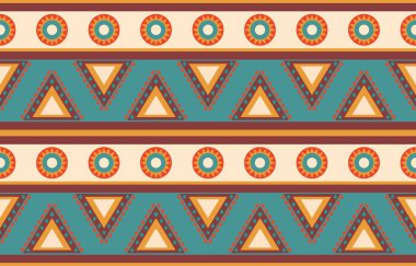 Aztek ve Navajo motiflerinin yer aldığı geometrik etnik Amerikan Yerli kabile desenleri kusursuz bir dekoratif doku oluşturur. Arkaplan, perde, halı, giysi, ambalaj için tasarım, Batik.