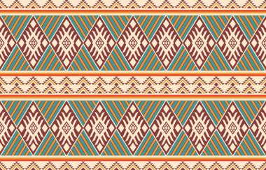 Aztek ve Navajo motiflerinin yer aldığı geometrik etnik Amerikan Yerli kabile desenleri kusursuz bir dekoratif doku oluşturur. Arkaplan, perde, halı, giysi, ambalaj için tasarım, Batik.
