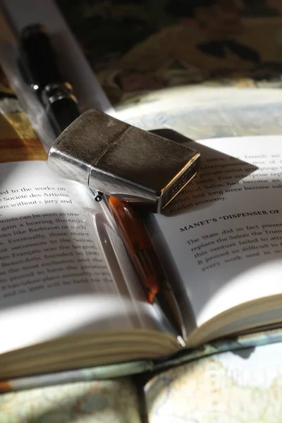 close up of a book and a bible