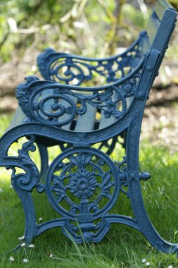 green park bench in spring