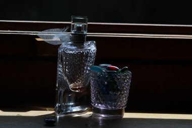 hookah and glass of wine on black background