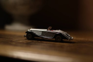 vintage toy car and a white background