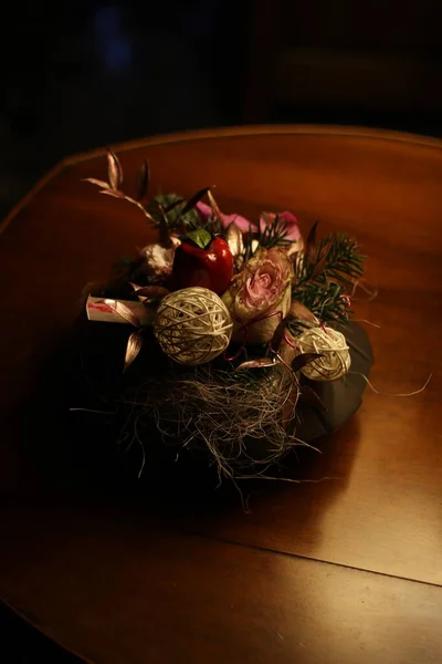 christmas wreath on a black wooden background