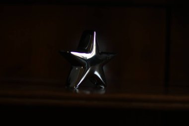 star of the stars and a black ribbon with a white background