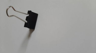 Binder or paper clip or office bind clip, stationery, realistic object on isolated white background