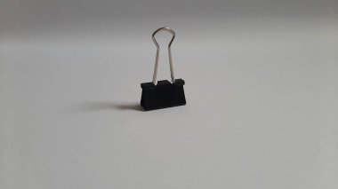 Binder or paper clip or office bind clip, stationery, realistic object on isolated white background