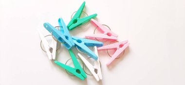 Colorful Plastic Clothespins or Cloth Clip Mixing Colors. Colour Clothes Peg. Home equipment.
