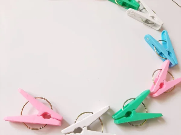Colorful Plastic Clothespins or Cloth Clip Mixing Colors. Colour Clothes Peg. Home equipment.
