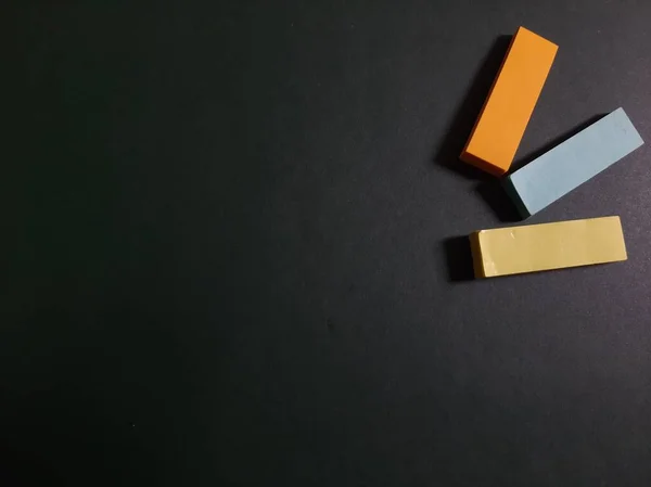 Pastel and Neon Sticky Notes or Paper Index or Page Marker or Flags Tabs or Note Adhesive Post Highlighter or Memo Pads for Highlighting Documents on Isolated Dark Background