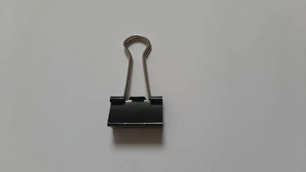 Binder or paper clip or office bind clip, stationery, realistic object on isolated white background