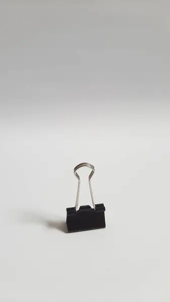 Binder or paper clip or office bind clip, stationery, realistic object on isolated white background