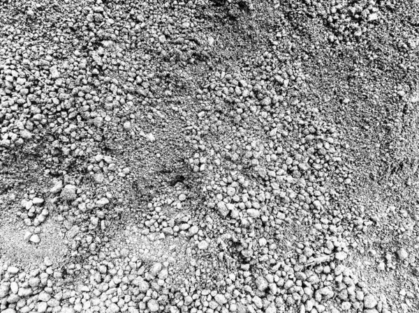 monochrome pile of gravel sand or soil for construction