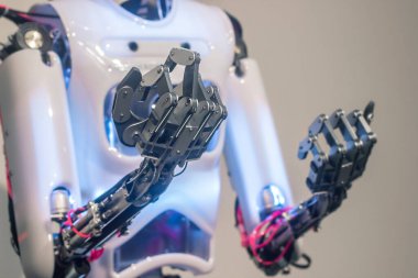 robot arm made of steel. Place for text.