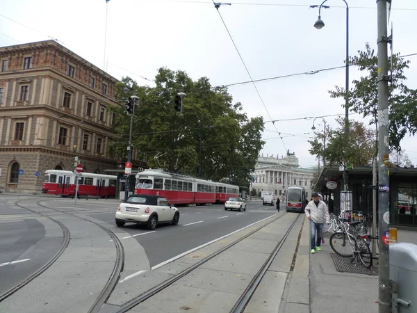 Old and modern tram on Vienna's street. Austria.