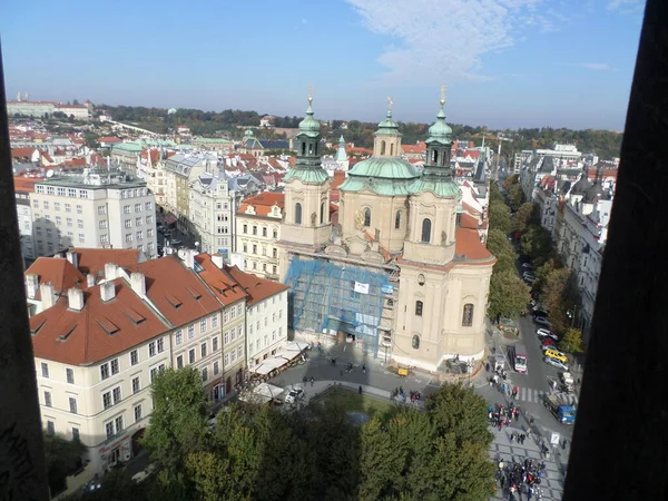 St Nicholas Church seen from top of Astronomical clock. Next to the Old Town Square, there is the imposing Astronomical Clock. Built in 1410 by clockmaker Mikulas de Kadan, it is considered one of the oldest in Europe. Prague. Czech republic