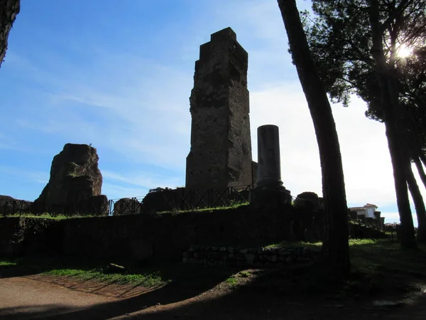 stock image Roman Forum, which was the place where all the commercial center of Ancient Rome was concentrated, and where citizens gathered to talk about business, politics, law, economy and religion. Rome, Italy.