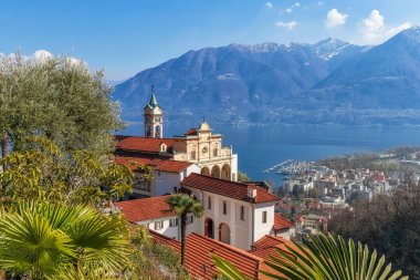 Early spring in Locarno, Ticino, Switzerland. View to Madonna del Sasso church and Lago Maggiore. clipart