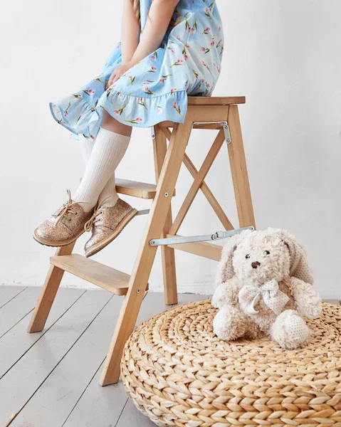 Girl Dress Sits Wooden Stool Next Plush Toy Bunny — Stock Photo, Image